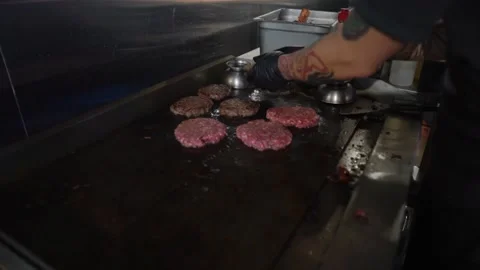 Spinning Pattys On The Griddle Stock Footage 197056534