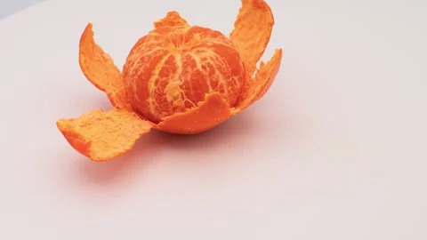 A spinning peeled orange Video stock 336656287