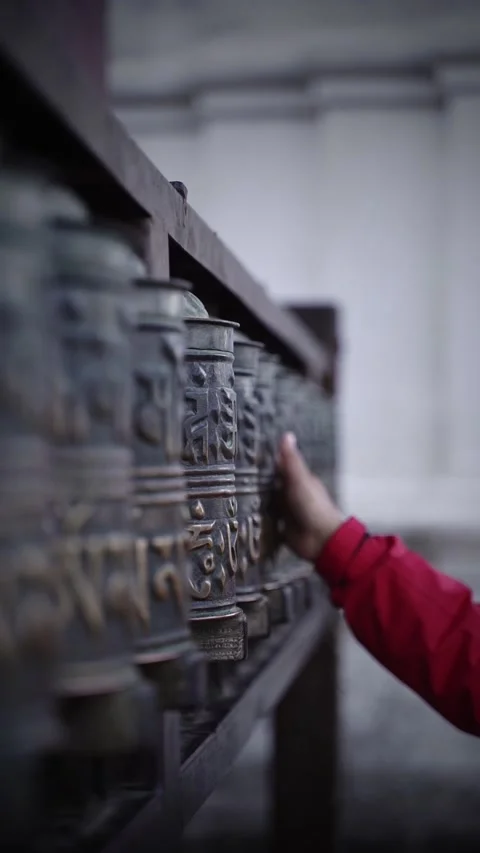 Spinning Prayer wheel at Buddhist Stupa at Kathmandu Nepal, Buddhist monument  Stock Footage 287896592