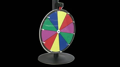 Spinning Prize Wheel on Black Video stock 56182372