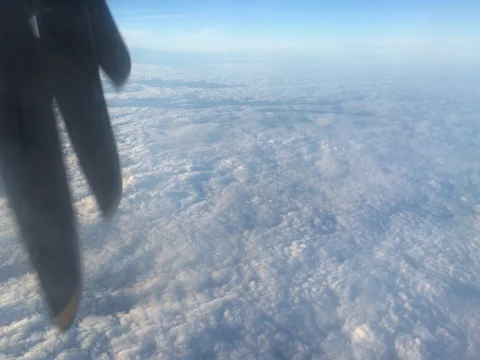 Spinning Propeller on Airplane above Cloud Bank on Flight (4K) Stock-Footage 79796371