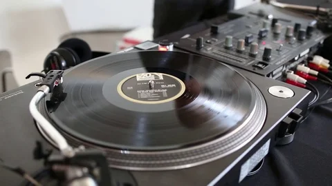 Spinning record on turntable Stock Footage