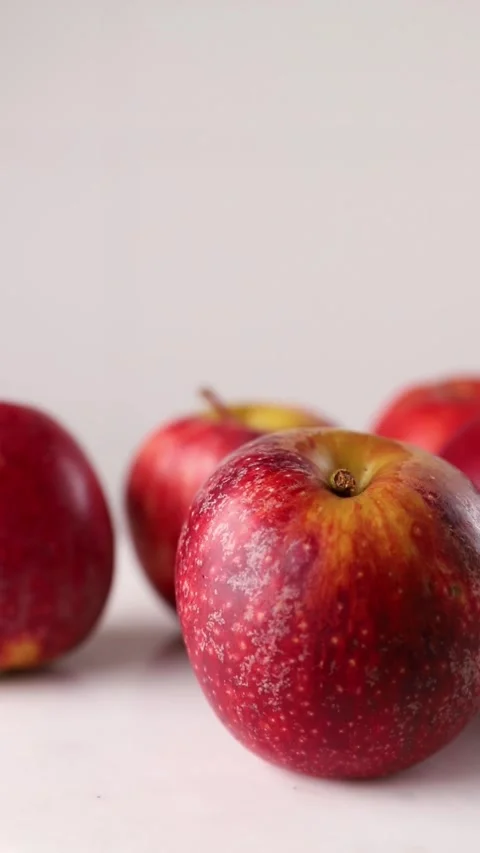 Spinning red apples on the white background Stock Footage 290804440