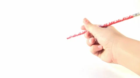 Spinning a Red Pencil on a White Background Stock Footage 42770227