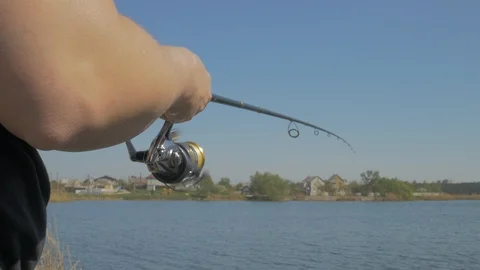 Spinning reel in action Stock Footage 107146546