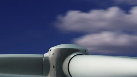 Spinning Rotor of 3D Rendered Wind Turbine on Rotating Blue Sky Background. Stock Footage 332750595