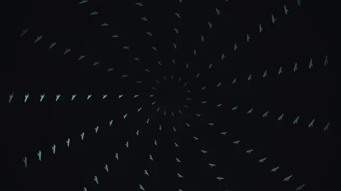 Spinning shapes create a dynamic visual experience in dark Stock Footage 339354134