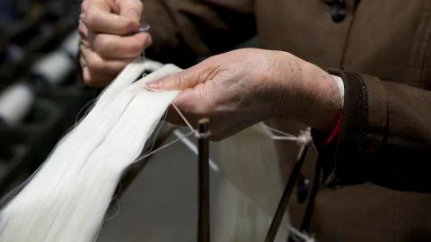 Spinning silk Stock-Fotos
