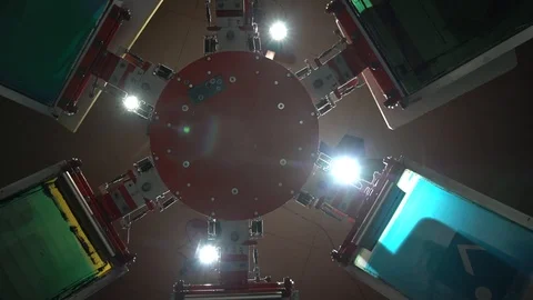 Spinning silk screen printing carousel Stock Footage 104543150