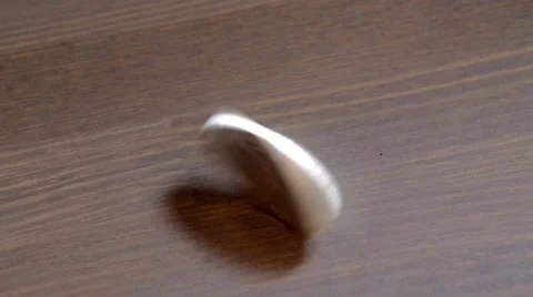 Spinning silver coin Stock Footage 56280705