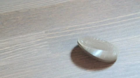 Spinning silver coin Stock Footage 56280709
