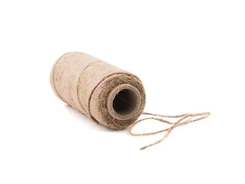 Spinning spool of beige thread on white background Stock Photos