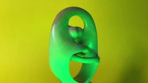 Spinning Statue of Couple Unity with Disco Lights Stock Footage 307679504