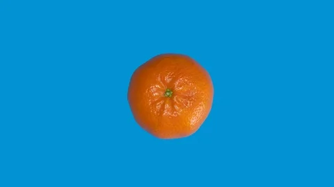 Spinning tangerine Stock Footage 126728509
