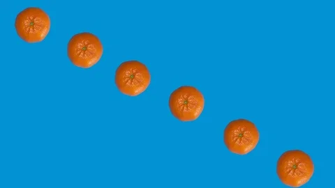 Spinning tangerine Stock Footage 126728937