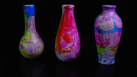 Spinning three vases on black background modern art concept Stock Footage 155689709