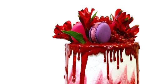 Spinning top of the wedding cake, decorated with red glazing, flowers, Stock Footage 106614488