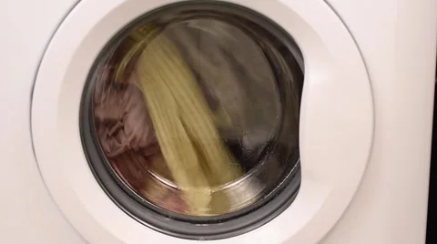 Spinning Washing Machine with Clothes Inside Stock Footage 60033036