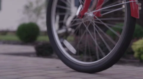 Spinning wheel of a bicycle Stock Footage 62758399