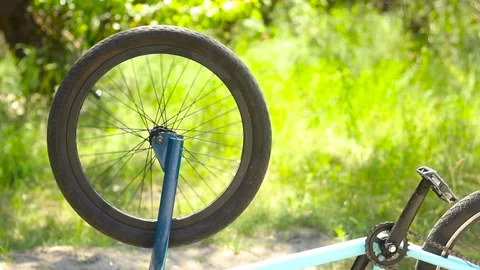 The spinning wheel of a bicycle. Stock Footage 134120834