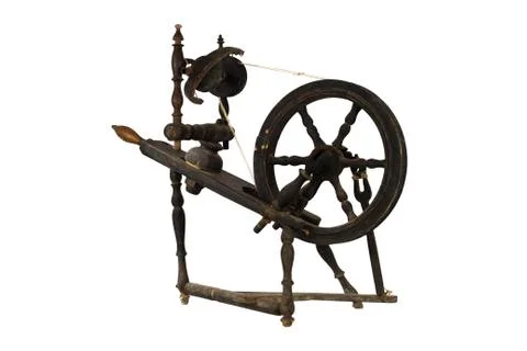 Spinning Wheel For Making Yarn From Wool Fibers. Vintage Rustic Equipment Stock Photos