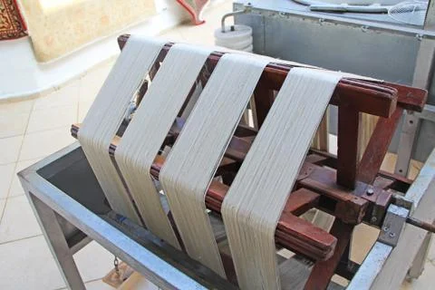 Spinning Wheel for Separating Silk Thread from Cocoons Stock Photos