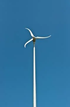 Spinning Windmill with Blue Sky Stock Photos