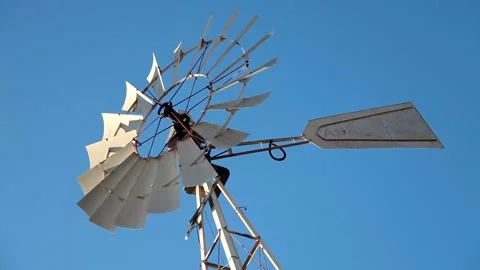 Spinning windmill, water pump. Cyprus Stock Footage 170431286