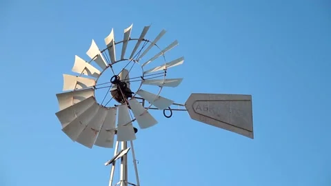 Spinning windmill, water pump. Cyprus Stock Footage 170431386