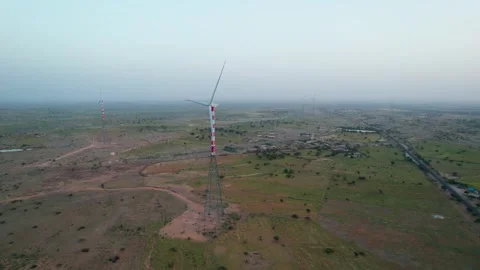Spinning Windmills During Sunset in Rajasthan’s Desert – Cinematic 4K Drone Stock Footage 319834357