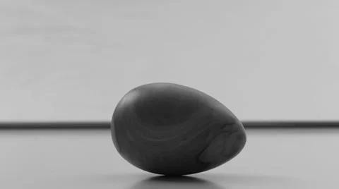 Spinning wooden egg Stock Footage 33932939