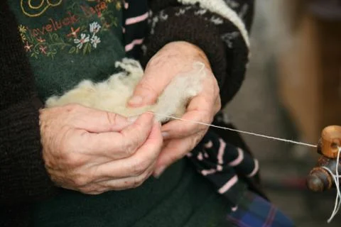 Spinning  wool. Stock Photos