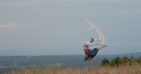 Spinning_at_Sunrise_Jumping Stock Footage 114132274