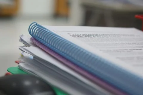 Spiral book and stack of data document Stock Photos