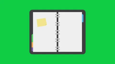 Spiral-bound notebook on green screen for school organization. Stock Footage 296634965