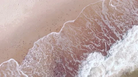 Spiral down drone view of paradisiac tropical waves on summer vacation Vídeo Stock 136803786