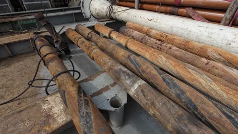 Spiral Drill Collars Stored on Rig Cantilever Deck Stock-Footage 337141426