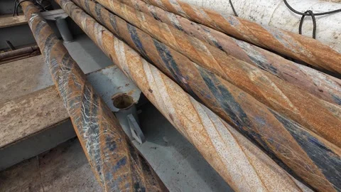 Spiral Drill Collars Stored on Rig Cantilever Deck Video stock 337141456