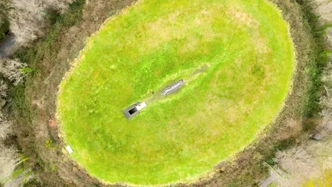 Spiral drone flight over Irish Sky Garden Crater Stock Footage 231144743