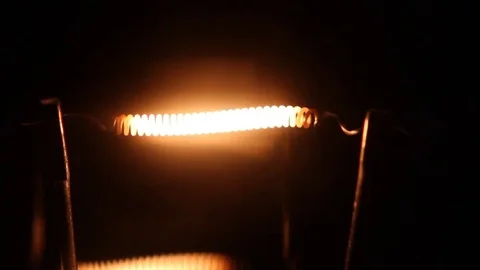 Spiral inside is brightly shone the light bulb 스톡 동영상 80288748