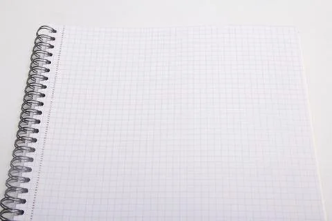 Spiral note book with checked pages Stock Photos