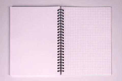 Spiral notebook with blank graph paper pages, central focus, simple clean set Stock Photos