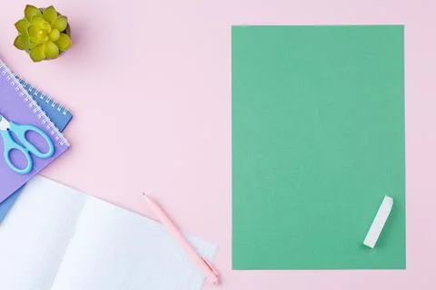 Spiral notebook with notepad and pen on desk. Stock Photos