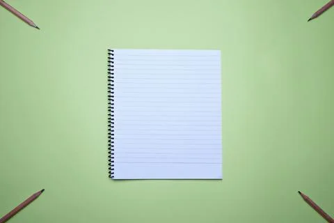 Spiral Notebook for notes and planning on a green background Stock Photos