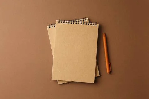Spiral notebook with a pen. Stock Photos