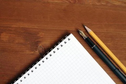 Spiral notebook on the table Stock Photos