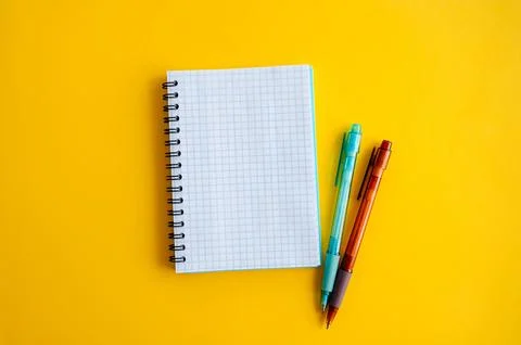 Spiral notebook for writing down goals and plans and a pen Stock Photos