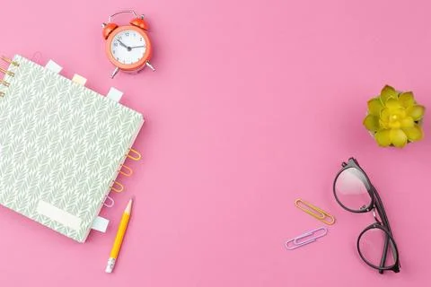 Spiral notepad on pink background. Stock-Fotos