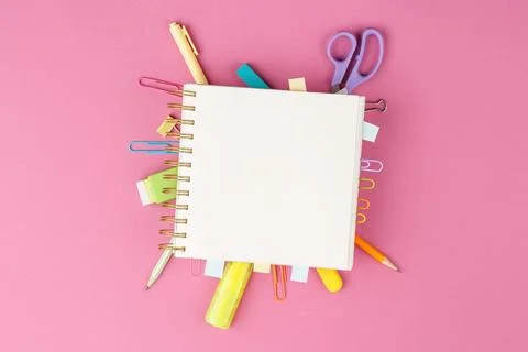 Spiral notepad on pink background Foto stock