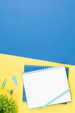 Spiral notepad with stationery on office table. Stock-Fotos